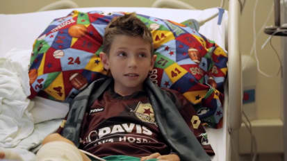 Hospital, soccer team partner to help a boy facing osteomyelitis