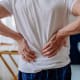 Cedars-Sinai investigators have taken promising steps toward understanding the root causes of disk-associated low-back pain. Photo by Getty.