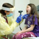 Pediatric pulmonologist Lori Vanscoy, with a patient in the Johns Hopkins Cystic Fibrosis Clinic.