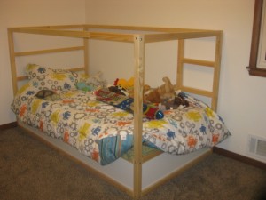 Linc's big boy bed. If the bed is flipped over it becomes a mini loft style bed with a play area underneath. He's too little to navigate the ladder on the way down so he'll have to wait for that awesomeness to happen.