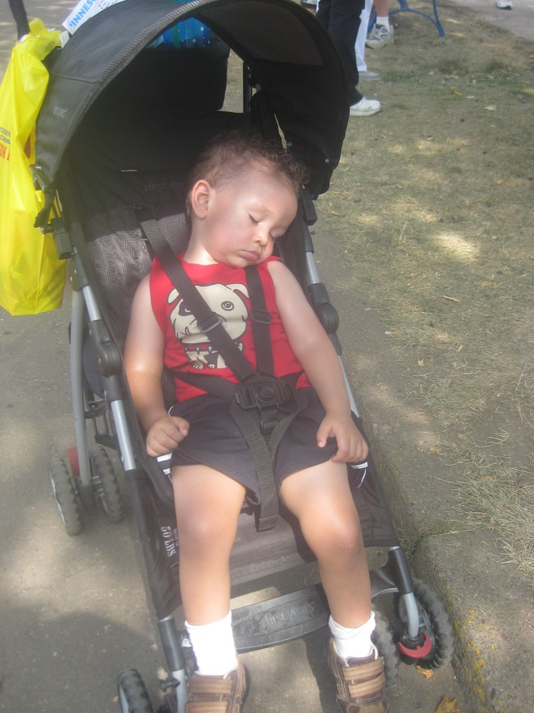 Conked out after a nice day at the fair. (If you look closely you can see his "farmer's tan" - from out many walks out and about and yes we do use sunscreen we just get out a lot.)
