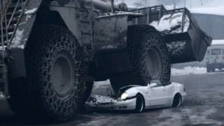 Mercedes CLK crushed by giant earthmover | video