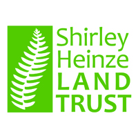 Logo for "SHIRLEY HEINZE LAND TRUST INC"