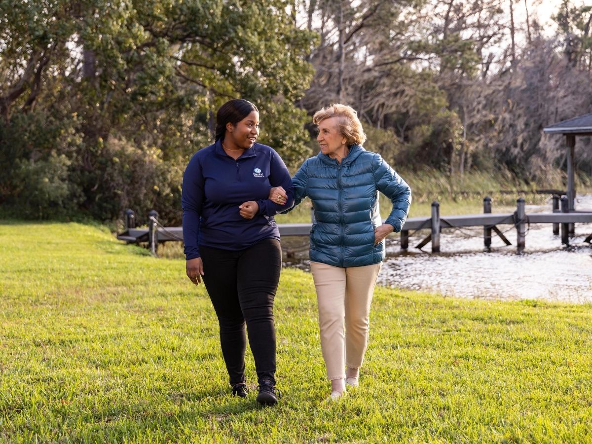 Comfort Keepers caregiver assisting a senior client at home in Palo Alto, CA