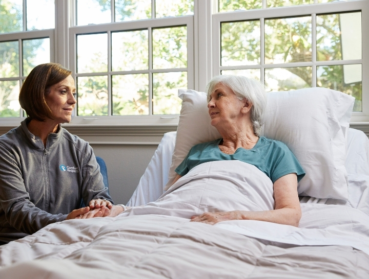 A Comfort Keepers caregiver spending quality time with a senior client at home in Fort Worth, TX
