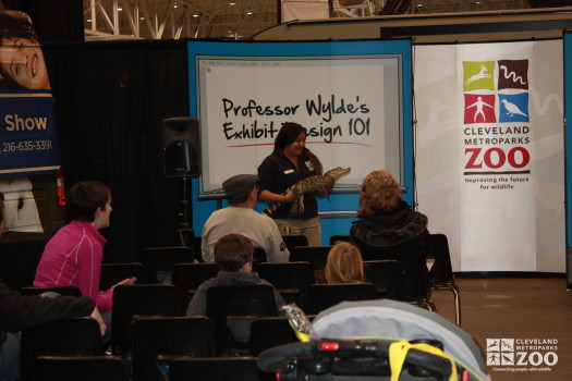 Adriana with American Alligator in front of Backdrop- 2014 RV Show