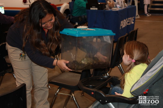 Adriana and girl with Marine Toad