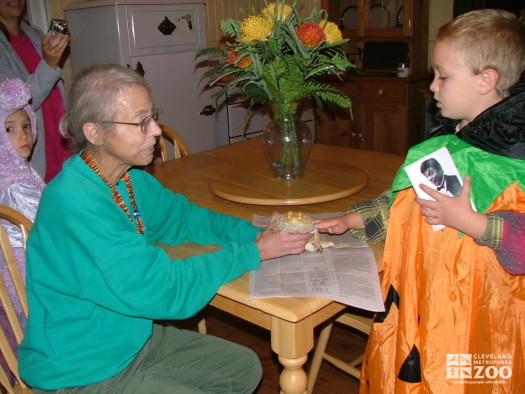 2007 Boo at the Zoo - Volunteer Lynn Szalay gets guests close to a frog