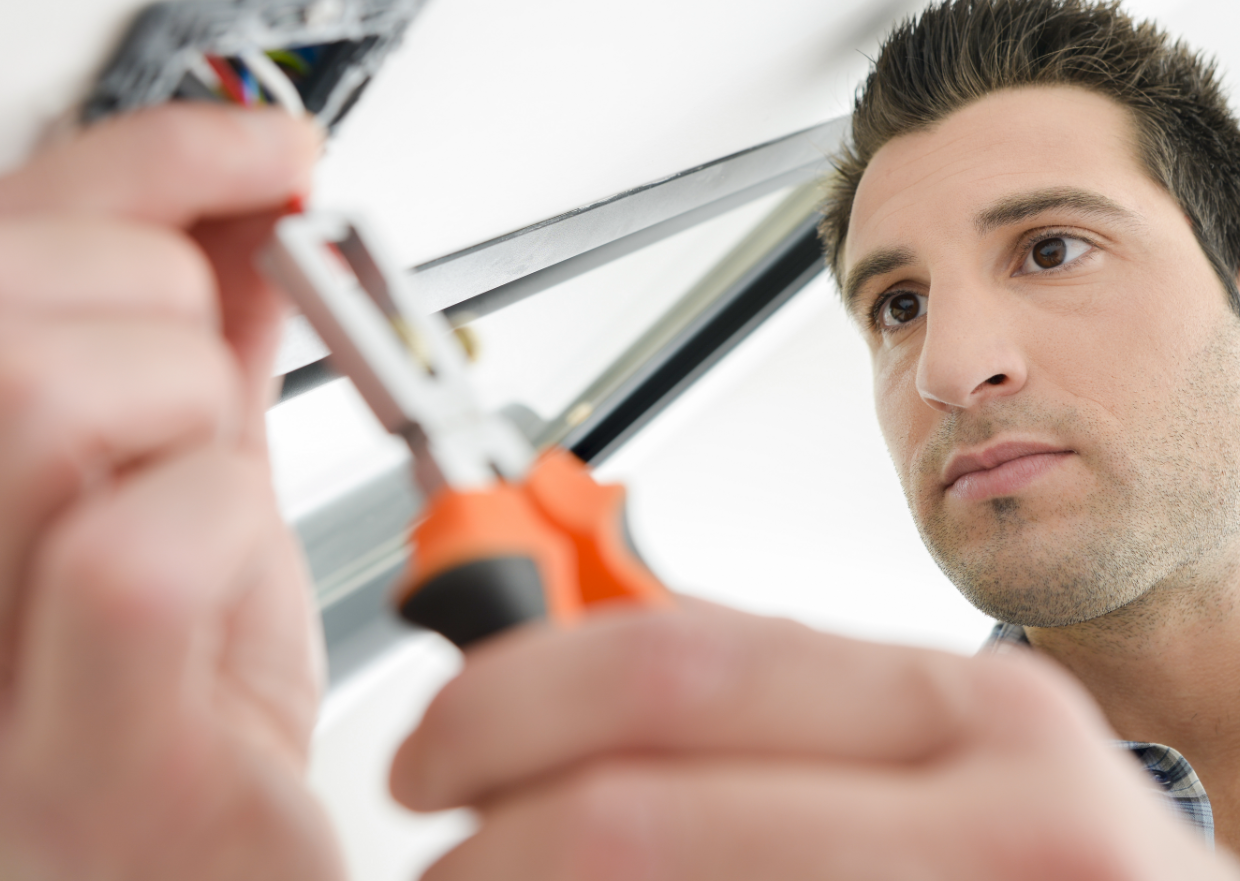 Man installing Smart lighting panel