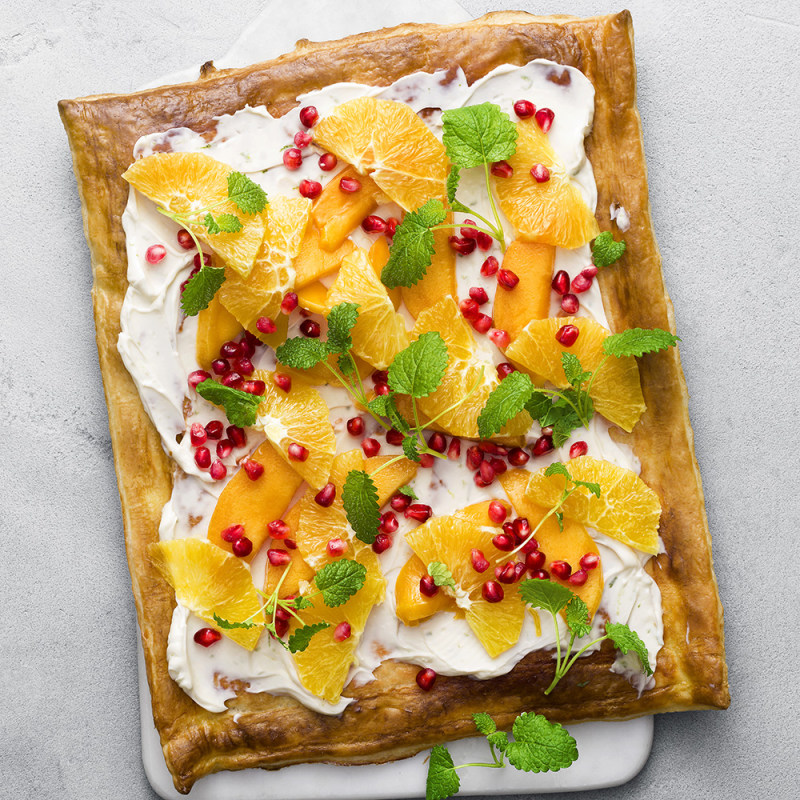 Smördegspizza med mango och apelsin