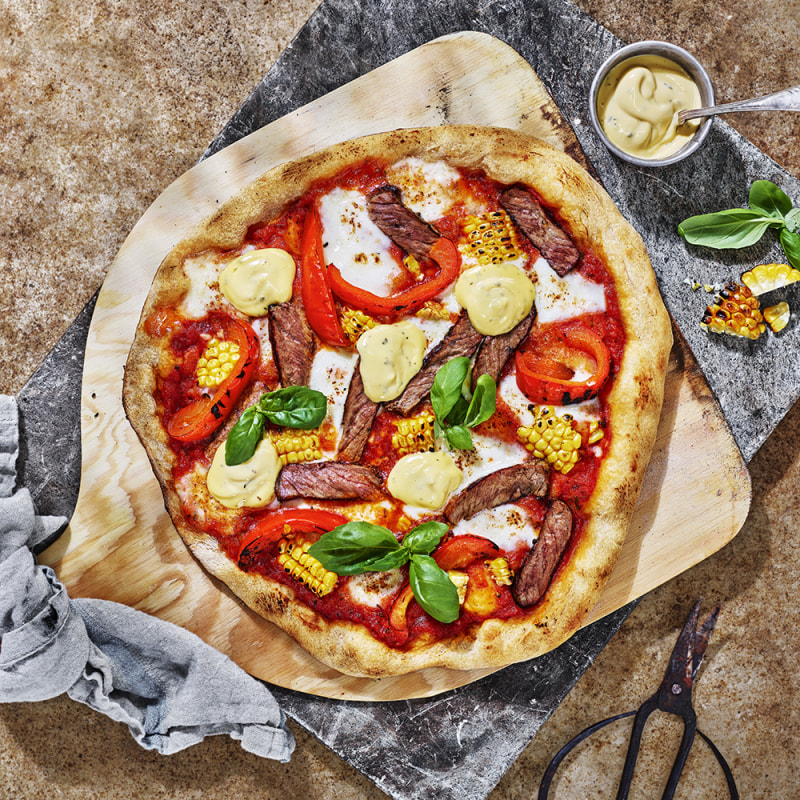 Pizza på grillens rester