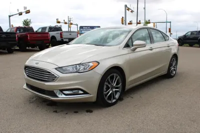 Introducing the 2017 Ford Fusion SE sedan, a reliable and stylish option for your dealership's inventory. With 103,398 km on the odometer, this vehicle strikes an excellent balance between age and mileage, making it an attractive choice for budget-conscious buyers.
Priced competitively at $13,900 CAD, this Fusion offers exceptional value in the midsize sedan market. Its reputation for dependability and fuel efficiency positions it well for resale, appealing to a wide range of customers seeking a practical yet sophisticated vehicle.
This Ford Fusion SE is equipped with essential features that enhance both comfort and performance, ensuring it meets the demands of today's drivers. Don't miss the opportunity to add this well-maintained sedan to your lot, where it can serve as a profitable asset for your business.