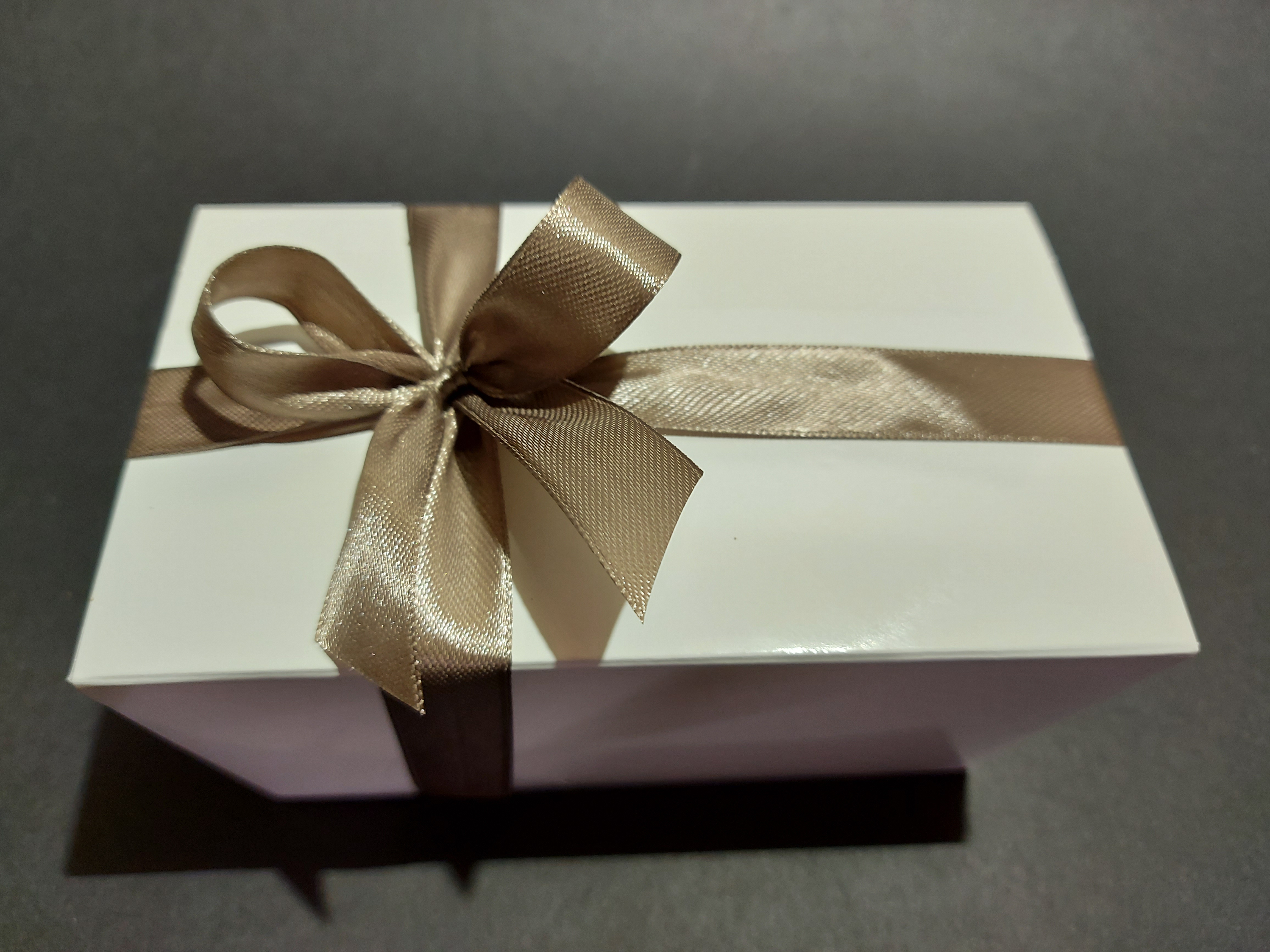 Schilfertruffels in ballotin met strik - 550 gr - melkchocolade