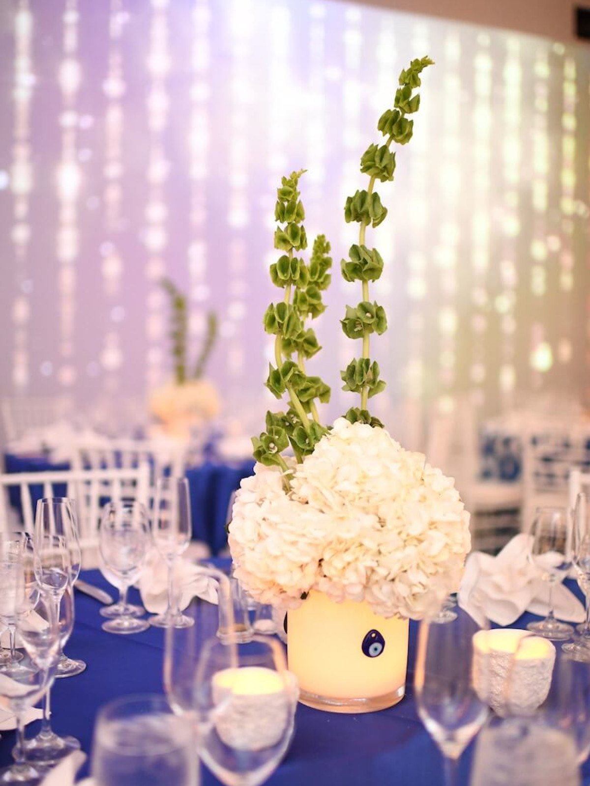 Wedding Pugh Dascoulias floral arrangement with Greek evil eye