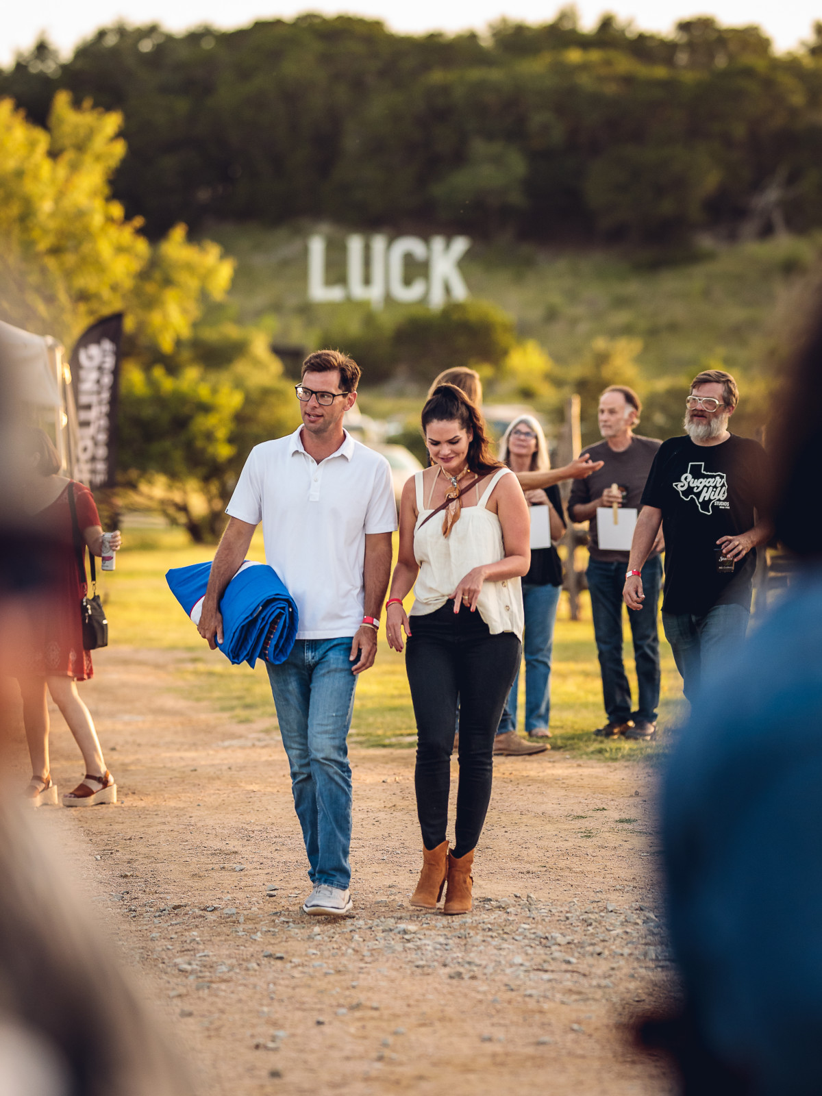 Luck Cinema sign and couple
