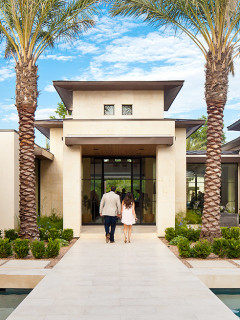 Exterior of home on the AIA Homes Tour with couple out front