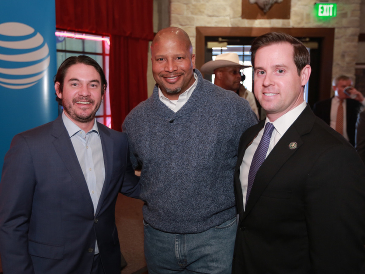 : Joshua Sanders, unidentifed, Chris Brown at Mayor's Rodeo Kickoff Breakfast