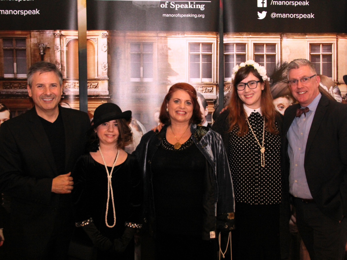 D͞ownton Abbey Manor of Speaking͟ Ernie Manouse and St.John Flynn pose with costume contestants at the Downton Abbey season 6 premiere in The Woodlands.