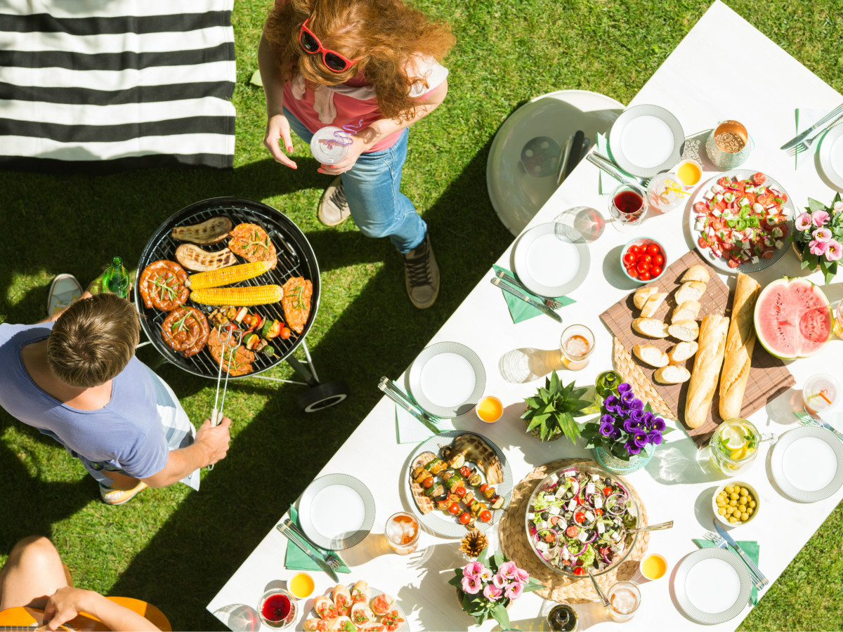 Man and woman grilling
