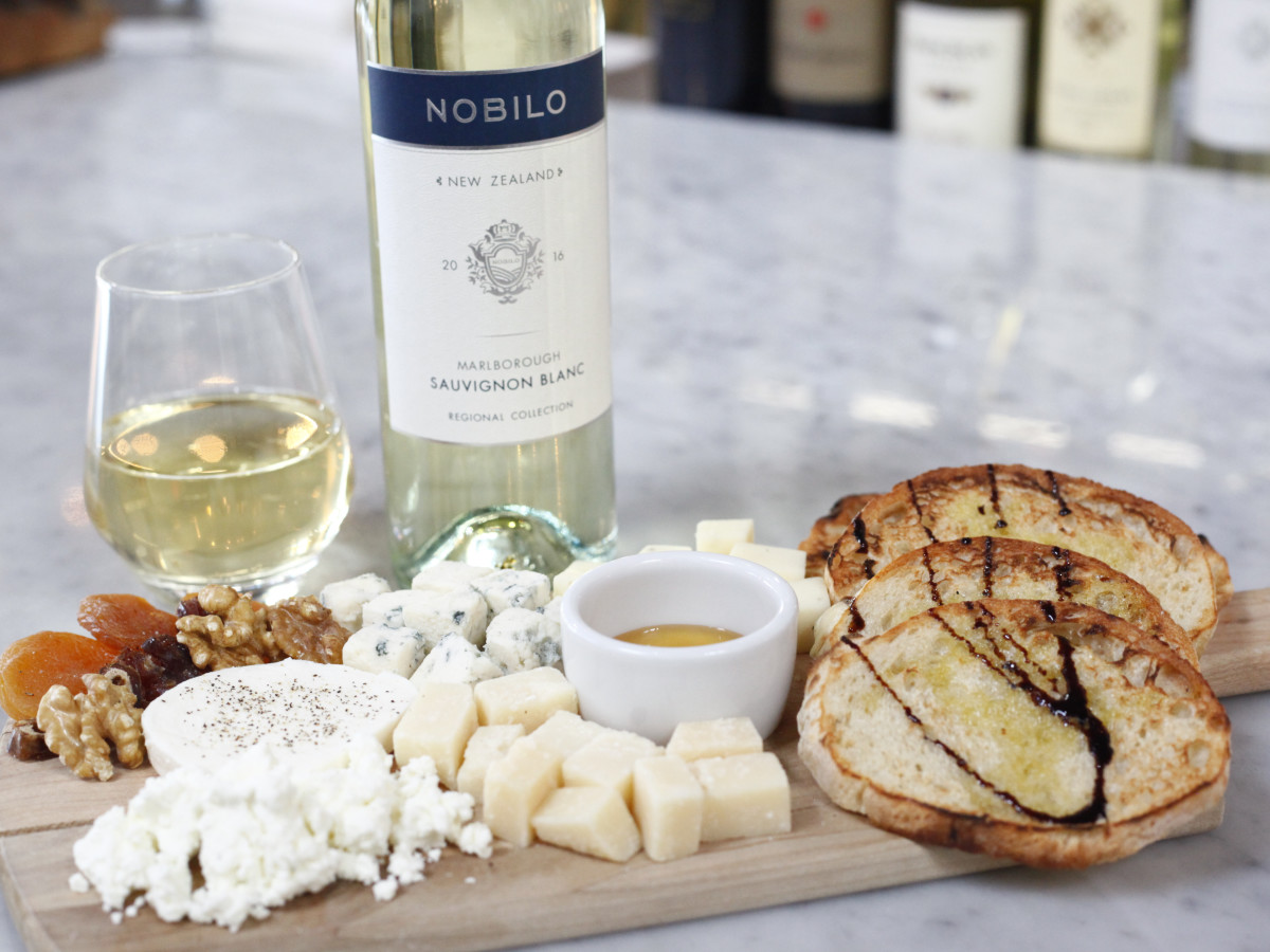 Midici cheese platter and bottle of wine