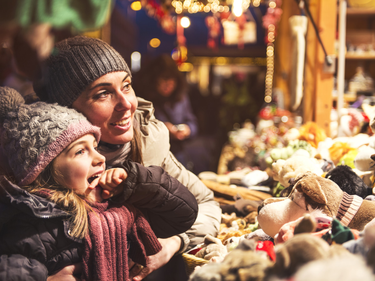 Mother and daughter looking at toys