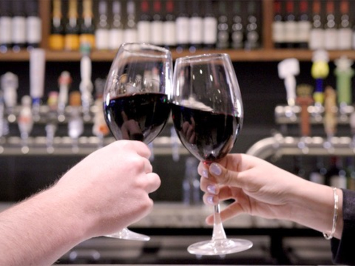 Clinking wine glasses