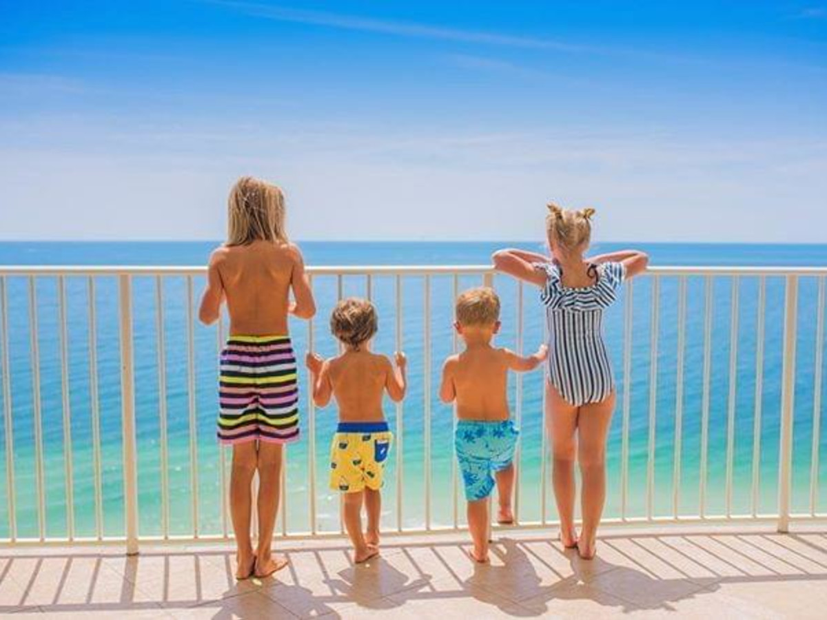 Kids looking out onto the ocean