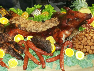 Kirby Ice House presents Kona Brewing Co. Pig Roast & Luau