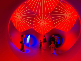family and kids in Architects of Air luminarium at the Long Center