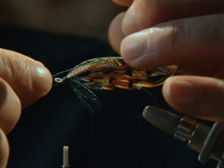 scene from the film Kiss the Water fishing fly