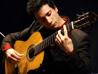 classical guitarist Grigory "Grisha" Goryachev playing guitar
