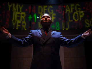 The University of Texas at Austin Department of Theatre and Dance presents Enron