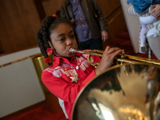 Kid playing instrument