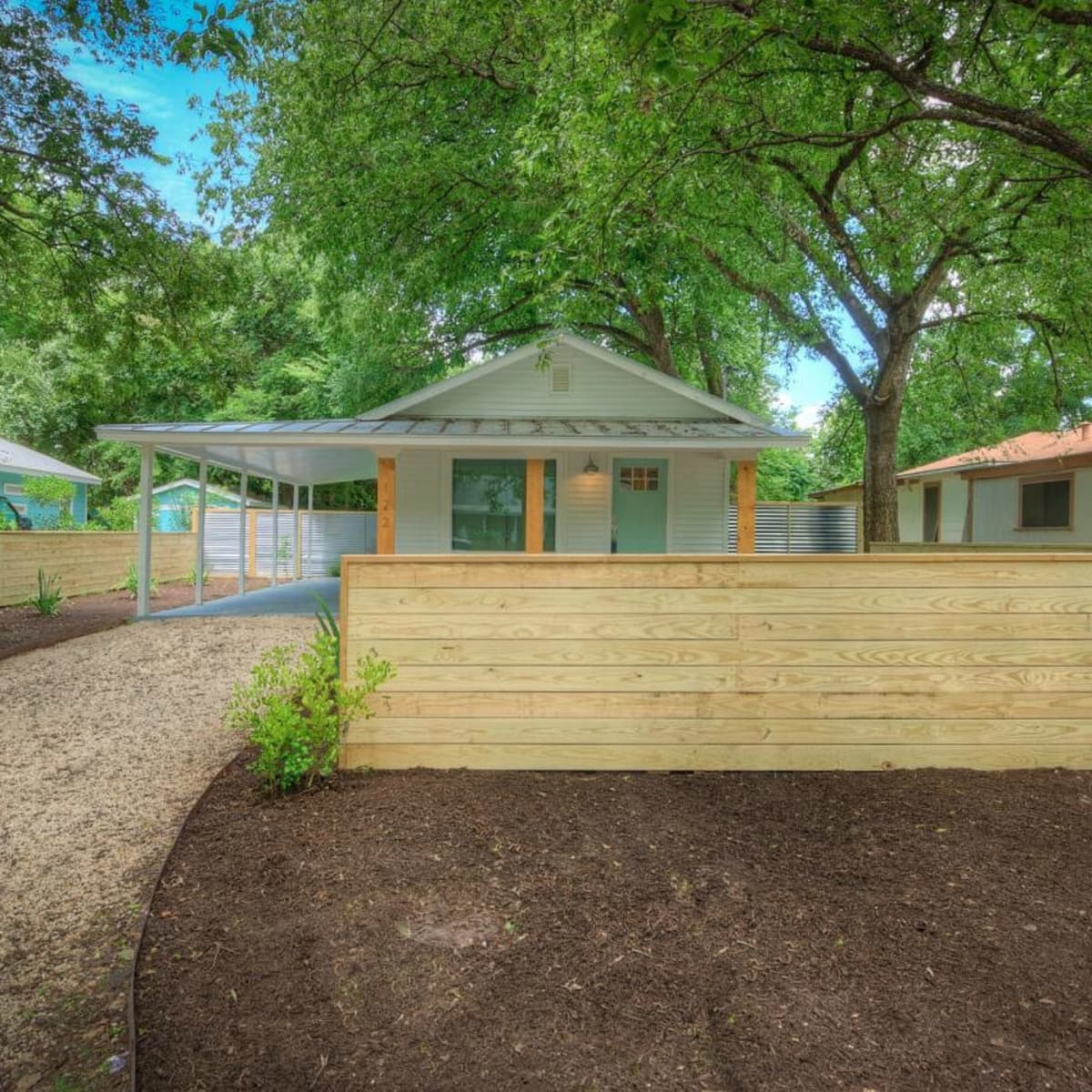 1122 Gunter St 78702 East Austin house front fence 2015