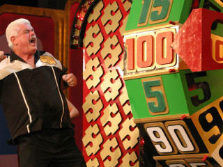 contestant on Price is Right Live winning on the big wheel during Showcase Showdown