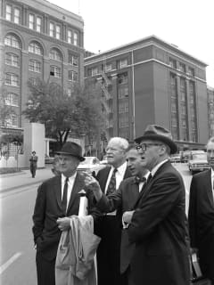 Warren Commission members and staff visit Dealey Plaza in 1964