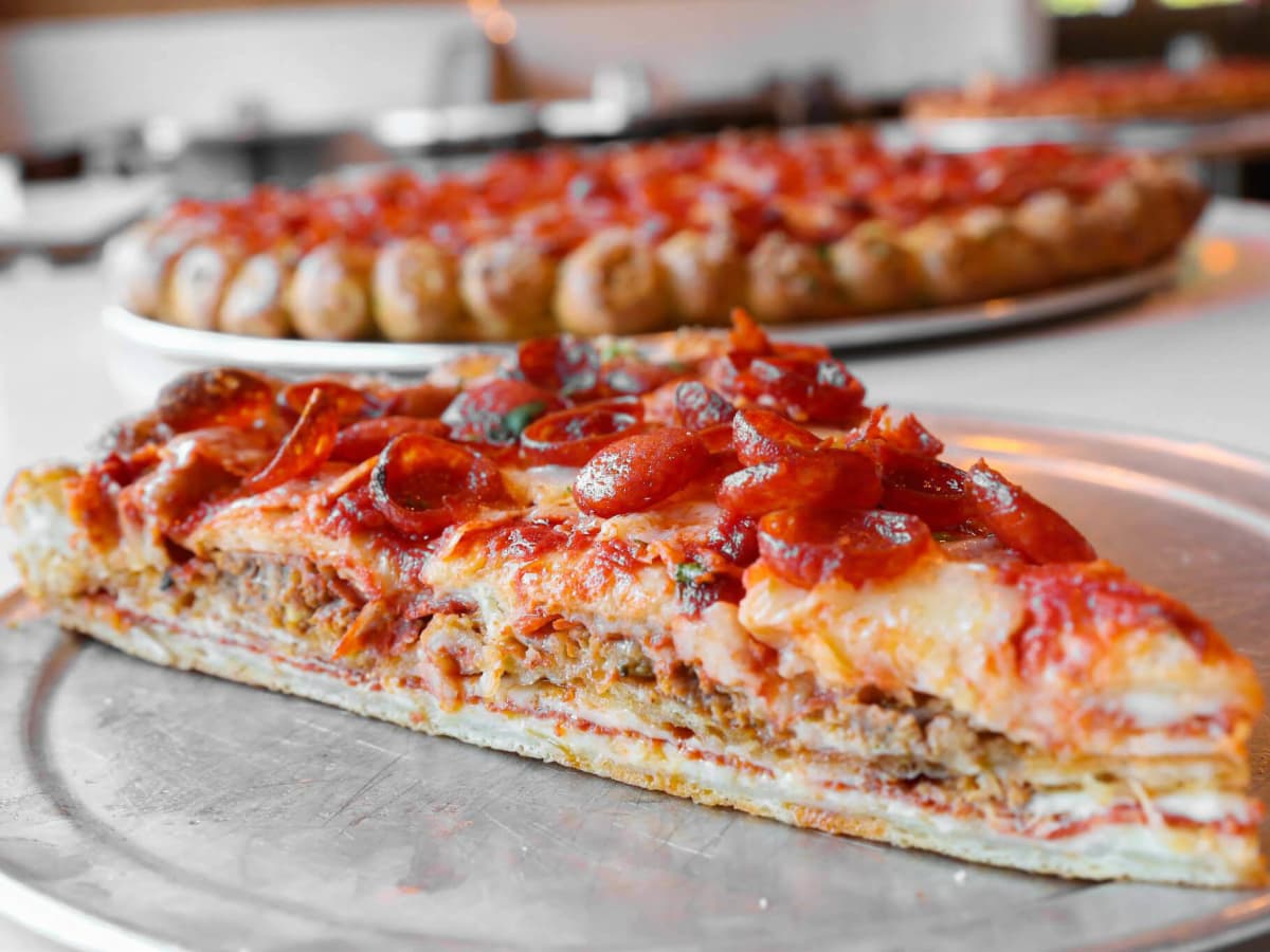 Slice of Meatzilla at Zoli's NY Pizza Tavern in Dallas
