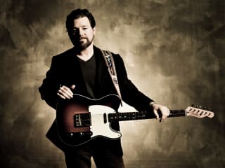 country singer and musician Clay McClinton with a guitar