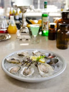 driftwood, oysters, absinthe