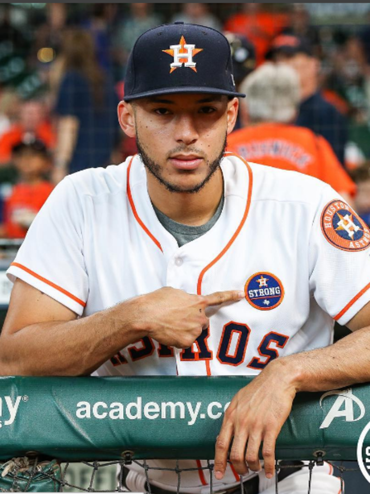 Carlos Correa points out Houston Astros Strong logo