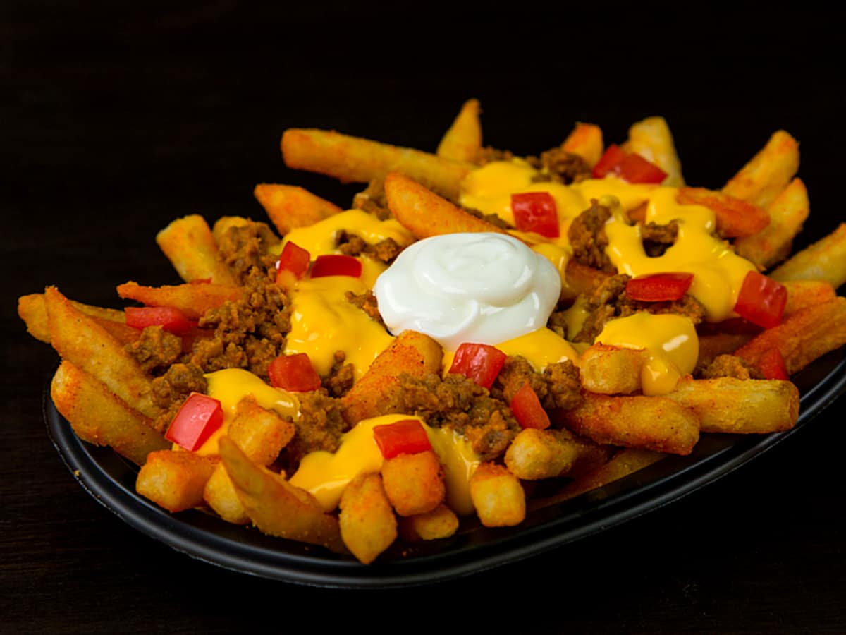 Taco Bell plays ketchup to burger kings with new cheesy fries