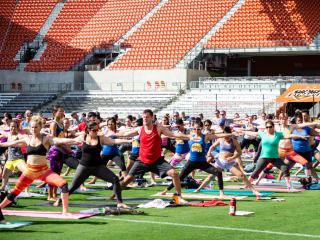 yogaOne Studios and Houston Dash present Yoga on the Pitch
