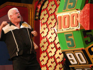 contestant on Price is Right Live winning on the big wheel during Showcase Showdown