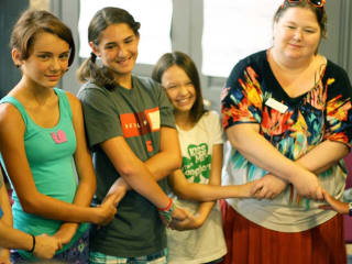 young girls and mentor at GENaustin We Are Girls Conference
