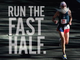 old man with long beard running in 3M Half Marathon