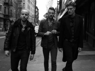 new york band The Kin walking down a street