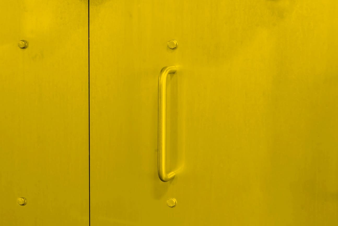 metal door in stainless steel yellow color