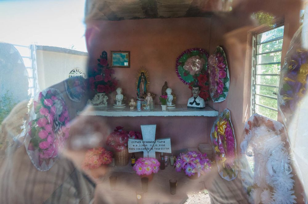Jesús Malverde bust on a grave in Sinaloa, Mexico.