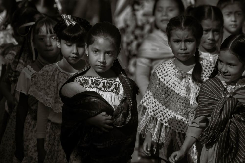 Soldaderas march in the Revolution Day parade in San Antonio Tlayacapan, Jalisco, Mexico.