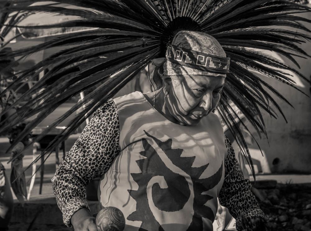 An Aztec dancer during the Fiesta for the Virgin of Rosario in Ajijic, Jalisco, Mexico.